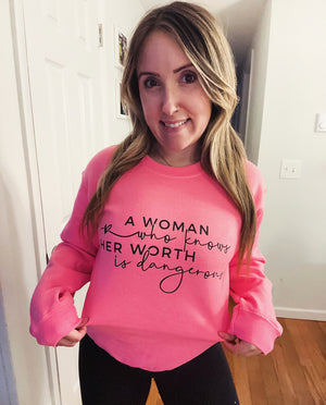 A Woman Who Knows Her Worth Is Dangerous Pink Full Size UNISEX Fleece Sweatshirt
