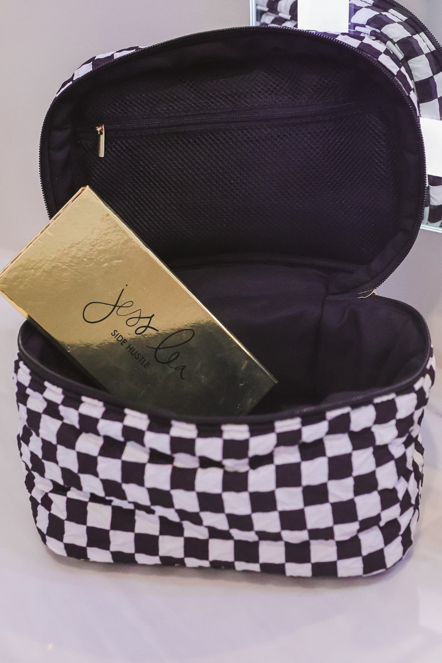 The Jetsetter Checker Quilted Makeup Bag